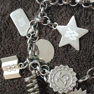 Silver tone charm bracelet